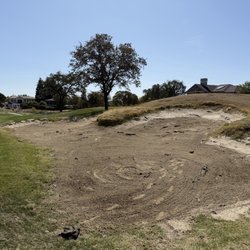 The Golf Club at Copper Valley - The black spot are fabric coming through the sand