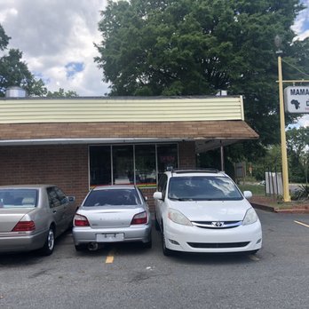 Mama Gee's Takeout Restaurant - Outside. Small parking lot - African Near Me - Charlotte, North Carolina