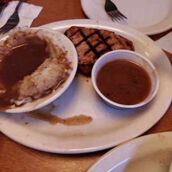 Texas Roadhouse - Grilled pork chop with mashed potatoes - Steakhouses Near Me - Queensbury, New York Texas Roadhouse - Grilled pork chop with mashed potatoes - Steakhouses Near Me - Queensbury, New York