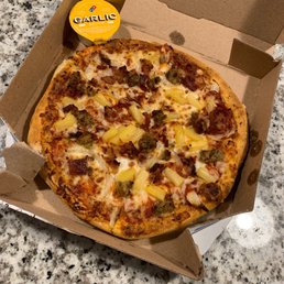 a pizza in a pizza box