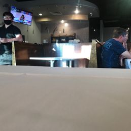 a man and a woman in a restaurant a man and a woman in a restaurant