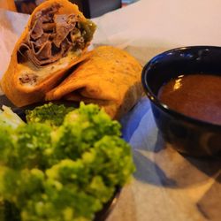 French dip in a wrap. Philly cheesesteak does NOT come with au jus