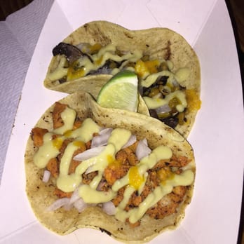 Atacolypse Now - Vegetarian Quitlacoche taco (corn truffle roasted with corn & mushrooms) and a carnitas taco!! DELISH!!! - Food Stands Near Me Atacolypse Now - Vegetarian Quitlacoche taco (corn truffle roasted with corn & mushrooms) and a carnitas taco!! DELISH!!! - Food Stands Near Me