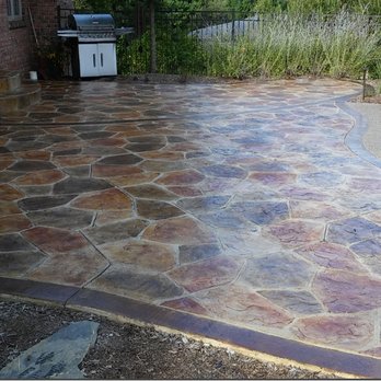 Axiom Construction - a stamped patio with a fire hydrant - Masonry/Concrete Near Me - Rochester Hills, Michigan Axiom Construction - a stamped patio with a fire hydrant - Masonry/Concrete Near Me - Rochester Hills, Michigan