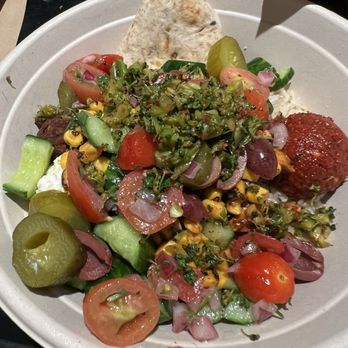 CAVA - Falafel, chicken , salty pickles  ,tomatoes and cucumber,hot harissa , corn,crazy feta ...yum!!! - Salad Near Me - Lancaster, Pennsylvania