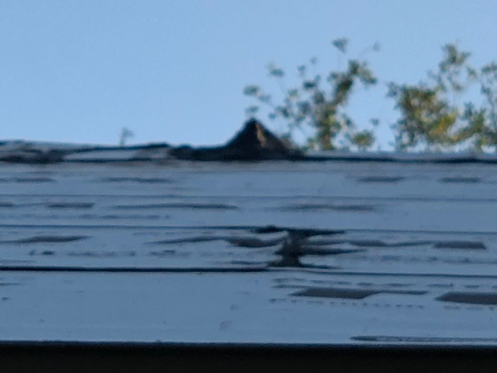 Slide of Kelly Roofing