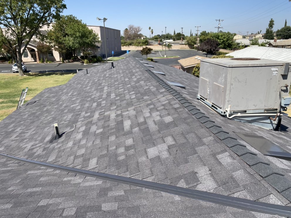 Slide of Modern Roofers and Restoration