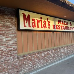 Maria's Pizza - The business front and logo.