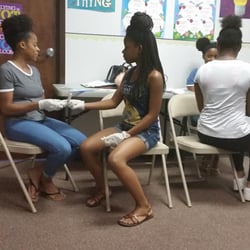 Academics-1st - Students preparing for lesson in CPR, AED, and first aid.