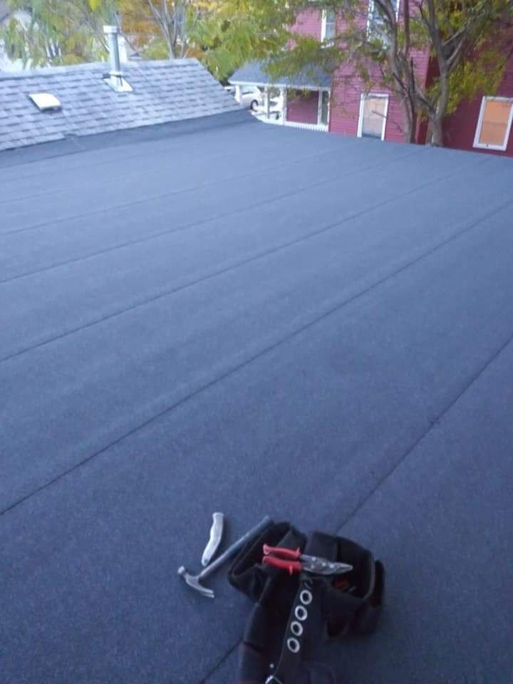 Slide of Mendoza & M  Roofing