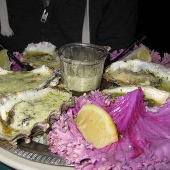 Tognazzini's Dockside - BBQ oysters sitting in a garlic butter bath - Seafood Near Me - Morro Bay, California