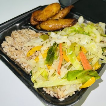 Irie Jamaican Cuisine - Jamaican styled Steamed Cabbages and Fried Plantains, On a bed of Rice and Beans - Caribbean Near Me - Chattanooga, Tennessee Irie Jamaican Cuisine - Jamaican styled Steamed Cabbages and Fried Plantains, On a bed of Rice and Beans - Caribbean Near Me - Chattanooga, Tennessee