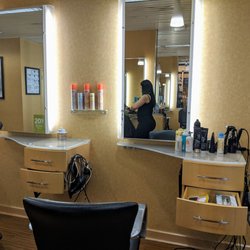 Regis Salon - Getting ready to look polished with a haircut trim.