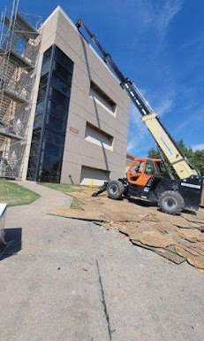 Slide of Dutchmark Roofing