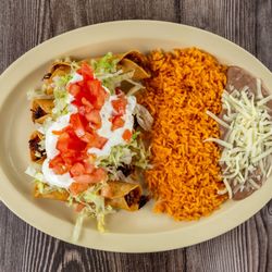 Chicken flautas with a side of rice and beans