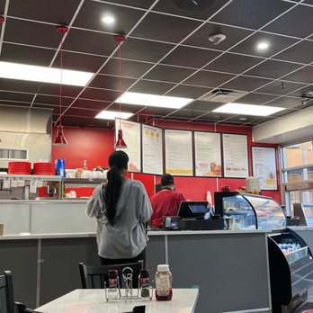 Deli Express Factory - a man standing at the counter - Desserts Near Me - Oxon Hill, Maryland Deli Express Factory - a man standing at the counter - Desserts Near Me - Oxon Hill, Maryland