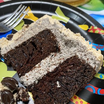 Lucy J Confections - a slice of chocolate cake - Cupcakes Near Me