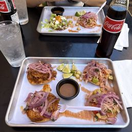Pork on red sauce tostadas, ceviche tostadas Pork on red sauce tostadas, ceviche tostadas