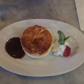 Enoteca Maria - Cheesecake with raspberry sauce. - Italian Near Me - Staten Island, New York Enoteca Maria - Cheesecake with raspberry sauce. - Italian Near Me - Staten Island, New York