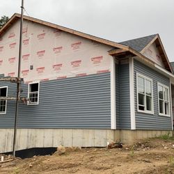 Carlos Remodeling Team - Siding Installed