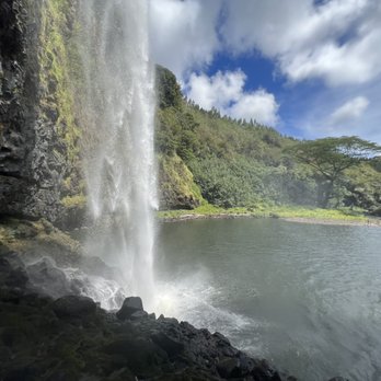 Wailua Falls - Wailua Falls view from behind the waterfall. - Parks Near Me - Lihue, Hawaii Wailua Falls - Wailua Falls view from behind the waterfall. - Parks Near Me - Lihue, Hawaii