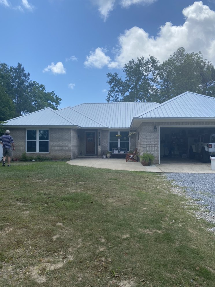Slide of T-Roys Relief Roofing