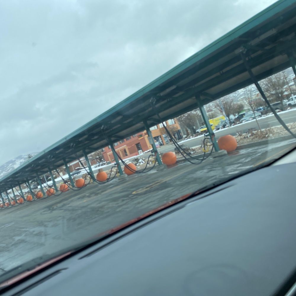 Quick Quack Car Wash - This is the vacuuming area and the garbage cans to put garbage in for cleaning your car. - Car Wash Near Me - Bountiful, Utah