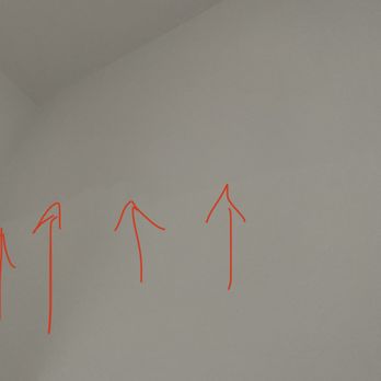 AT Paint and Plaster - arrows pointing at the demarcation between completely different shades of paint - Painters Near Me