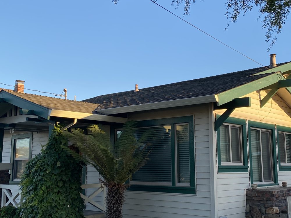 Slide of Urrutia Roofing