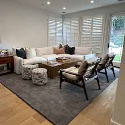 Custom sized area rug made from wall to wall carpeting.