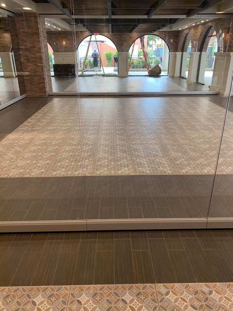 Slide of Millennia Roofing Solutions