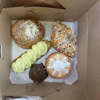 Kasama - Ube & huckleberry basque cake Matcha eclair Black sesame and coconut macaroon Truffle croissant Ube and coconut ensaymada - Filipino Near Me - Chicago, Illinois Kasama - Ube & huckleberry basque cake Matcha eclair Black sesame and coconut macaroon Truffle croissant Ube and coconut ensaymada - Filipino Near Me - Chicago, Illinois