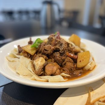 Kroran Uyghur Cuisine - Nyghur chicken (dapanji) - Chinese Near Me - Toronto, Ontario Kroran Uyghur Cuisine - Nyghur chicken (dapanji) - Chinese Near Me - Toronto, Ontario