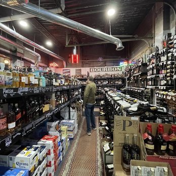 George's Liquors - a man shopping in a liquor store - Beer, Wine & Spirits Near Me - Oklahoma City, Oklahoma George's Liquors - a man shopping in a liquor store - Beer, Wine & Spirits Near Me - Oklahoma City, Oklahoma