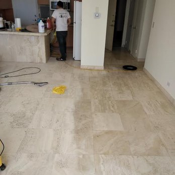 AA&J Floor Care - Re-grind Travertine surface in preparation for "matte" finish. - Flooring Near Me - Miami, Florida