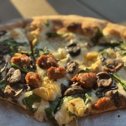 Your Pie Pizza - Clemson Dockside - White pizza plus sausage, spinach, mushrooms and artichokes.