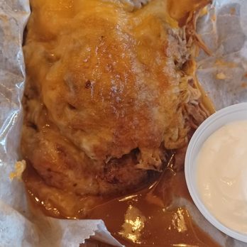 High Tide Taco Bar - Stuffed plaintin with pork, salsa rioja, blended cheese w/sour cream on the side - Mexican Near Me - Farmingdale, New York High Tide Taco Bar - Stuffed plaintin with pork, salsa rioja, blended cheese w/sour cream on the side - Mexican Near Me - Farmingdale, New York