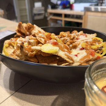 Four Leaf Brewing - Ancho nachos. Wishing the toppings reached the chips underneath, but they were naked chips. - Brewpubs Near Me - Clare, Michigan Four Leaf Brewing - Ancho nachos. Wishing the toppings reached the chips underneath, but they were naked chips. - Brewpubs Near Me - Clare, Michigan