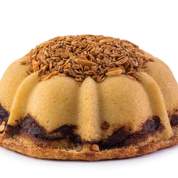 Janie's Cakes - Cinnamon Jane: Cinnamon swirled pound cake filled with cinnamon buttercream & topped with an oat & almond granola serves 12-15 - Bakeries Near Me - Tyler, Texas