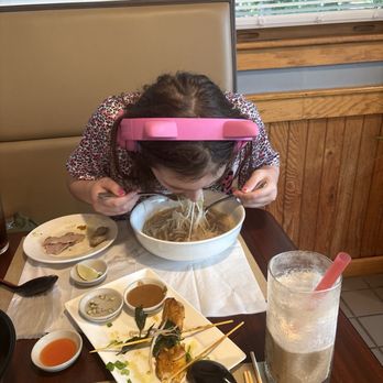 Noodle Kitchen - She loves the Pho so much she grabbed two forks to eat twice as much - Pan Asian Near Me - Milford, New Hampshire Noodle Kitchen - She loves the Pho so much she grabbed two forks to eat twice as much - Pan Asian Near Me - Milford, New Hampshire