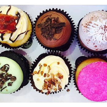 Smallcakes A Cupcakery - Real men eat cupcakes right? How about this colorful batch! - Bakeries Near Me - Albuquerque, New Mexico Smallcakes A Cupcakery - Real men eat cupcakes right? How about this colorful batch! - Bakeries Near Me - Albuquerque, New Mexico