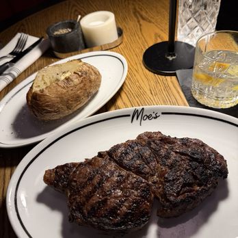 Moe's - Ribeye cooked to perfection, plain baked potatoe, just butter salt and pepper please! - Steakhouses Near Me - San Diego, California