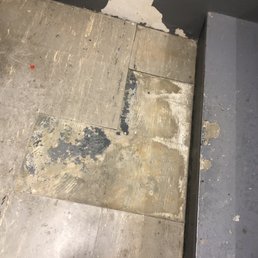 Staircase floor tiles coming up. Staircase floor tiles coming up.