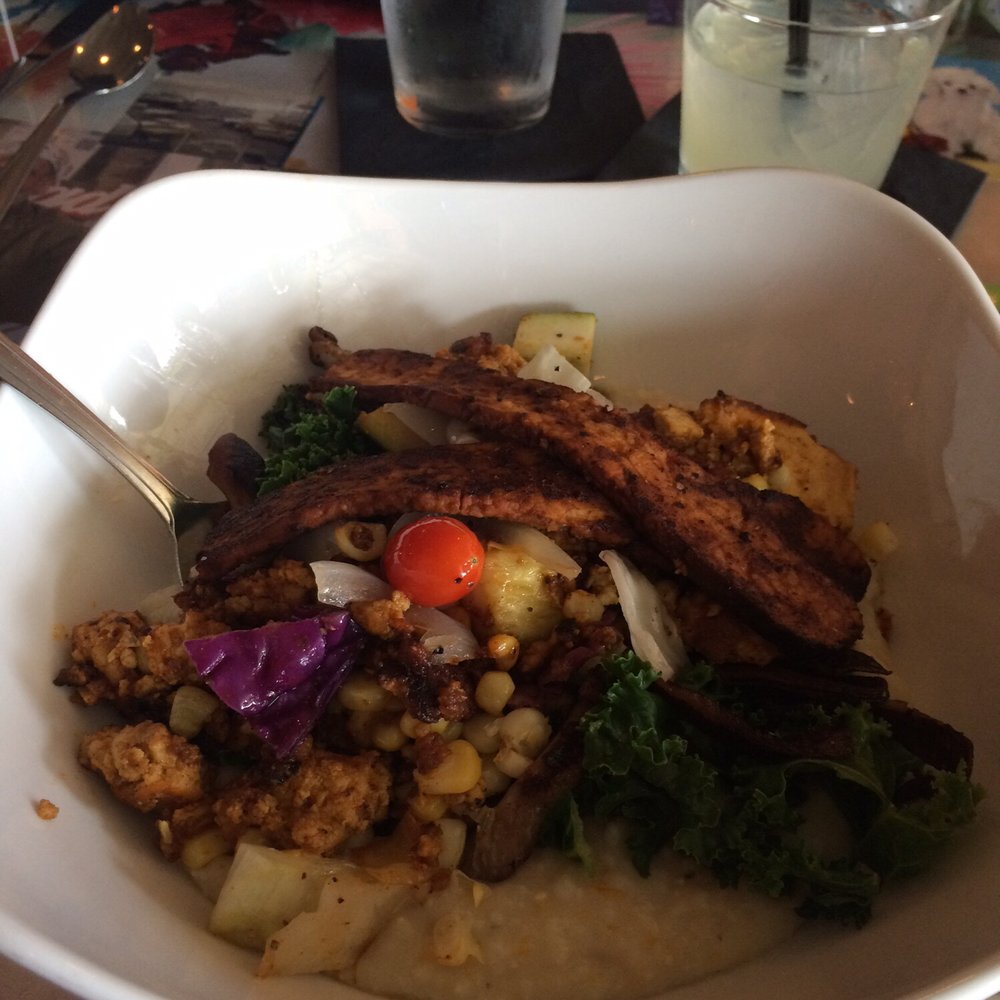 The Fiction Kitchen - Grits bowl with a Moscow Mule. - Vegan Near Me - Raleigh, North Carolina The Fiction Kitchen - Grits bowl with a Moscow Mule. - Vegan Near Me - Raleigh, North Carolina