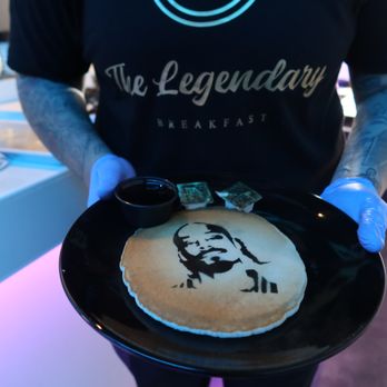 The Legendary Breakfast - a man holding a pancake - Breakfast & Brunch Near Me - San Diego, California The Legendary Breakfast - a man holding a pancake - Breakfast & Brunch Near Me - San Diego, California