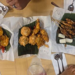Left - Vegetables fritters Middle - Fried tofu and vegetable fritter Right - Chicken satay Left - Vegetables fritters Middle - Fried tofu and vegetable fritter Right - Chicken satay