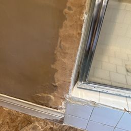 Cracked tiles before Grout Works. Cracked tiles before Grout Works.
