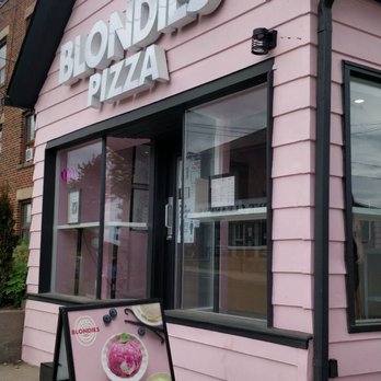 Blondie’s Pizza - a pink building with a sign for blondies pizza - Pizza Near Me - Mississauga, Ontario
