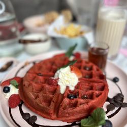 Laila's - SWEET RUBY BUTTERMILK WAFFLE (regular 11.5) / (grand 15.5) Whipped mascarpone, chocolate chips, fresh berries & maple syrup