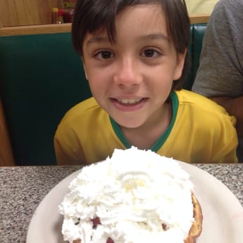 Bagelmania Restaurant - Max's favorite breakfast...Belguim Waffle, Strawberries and just a 'touch' of whipped cream...eats the entire thing! - Bagels Near Me - Sunrise, Florida Bagelmania Restaurant - Max's favorite breakfast...Belguim Waffle, Strawberries and just a 'touch' of whipped cream...eats the entire thing! - Bagels Near Me - Sunrise, Florida